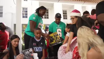 Dolphins players, AutoNation host toy distribution event at Sylvester Comprehensive Cancer Center
