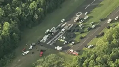 Skydiving plane goes off New Jersey runway and crashes into woods, sending at least 15 to hospital