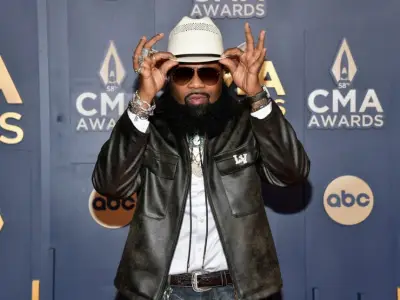 AI country hit ‘Walk My Walk’ built on Blanco Brown’s sound sparks questions of attribution, ethics