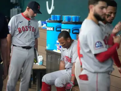 Red Sox brass, including John Henry, met with Rafael Devers following viral remarks about being asked to play 1B