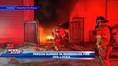 1 rushed to hospital after auto shop erupts in flames in Opa-locka