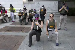 FBI agents sue after being fired for kneeling during racial justice protest
