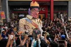 Thousands in Philippines protest corruption, demand return of stolen funds