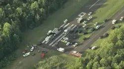 Skydiving plane goes off New Jersey runway and crashes into woods, sending at least 15 to hospital