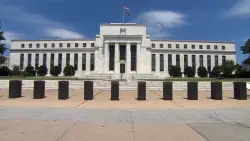 Federal Reserve cuts key rate but signals higher bar for future reductions