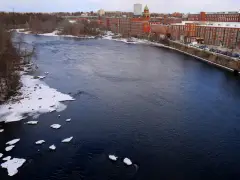 Person missing in Merrimack River, search will resume Thursday