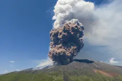 Mount Etna erupts, shooting a massive ash cloud into the sky and raising alerts
